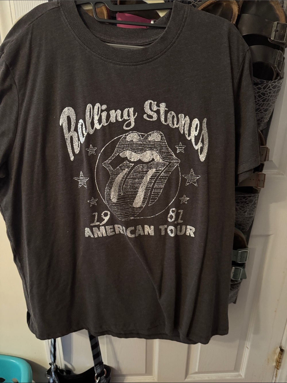 the Rolling Stones Black Graphic Tee with White Tongue Logo